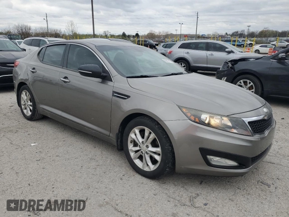 2013 Kia Optima EX z VIN 5XXGN4A7XDG224691, wystawiony jako Copart lot #52872175 z przebiegiem 218 951 mil mil oraz Szkoda całkowita • Salvage title. Historia ofert i sprzedaży dostępna na DreamBid. Obrazek 4.
