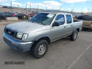 2000 Nissan Frontier XE with VIN 1N6ED27T7YC402398, listed as a IAAI auction lot 41794057 with 175,499 mi miles and . Bid and sale history available at DreamBid. Image 2.