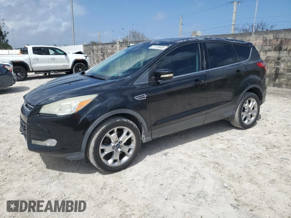 2013 Ford Escape SEL with VIN 1FMCU9H99DUD79003, listed as a Copart auction lot 51126005 with 104,151 mi miles and Clean Title. Bid and sale history available at DreamBid. Image 1.