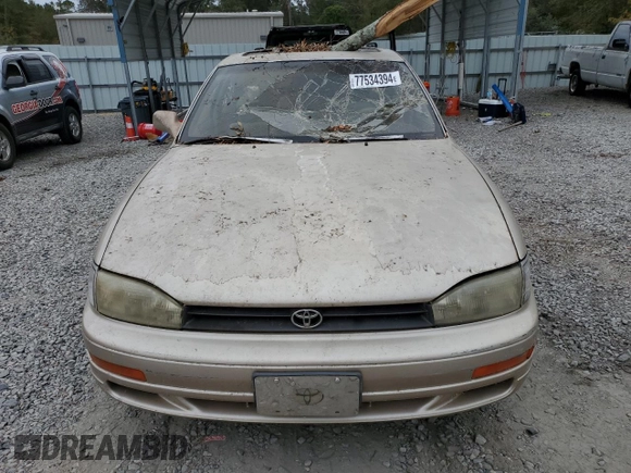 1993 Toyota Camry LE with VIN 4T1SK12E5PU316445, listed as a Copart auction lot 77534394 with 175,506 mi miles and Salvage Title. Bid and sale history available at carsss.com. Image 5.