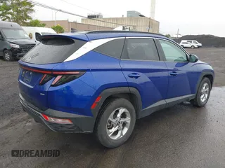 2022 Hyundai Tucson SEL z VIN 5NMJBCAE1NH026298, wystawiony jako IAAI lot #42365533 z przebiegiem 44 080 mil mil oraz . Historia ofert i sprzedaży dostępna na DreamBid. Obrazek 4.
