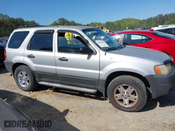 2003 Ford Escape XLT Popular 2 with VIN 1FMYU93183KD62338, listed as a IAAI auction lot 41990799 with 216,952 mi miles and . Bid and sale history available at DreamBid. Image 13.