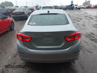 2017 Chevrolet Cruze LS z VIN 1G1BC5SM0H7158444, wystawiony jako IAAI lot #42224131 z przebiegiem 95 547 mil mil oraz . Historia ofert i sprzedaży dostępna na DreamBid. Obrazek 16.