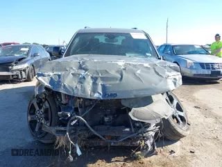 2019 Jeep Grand Cherokee Laredo E with VIN 1C4RJFAG2KC611457, listed as a IAAI auction lot 42212982 with 97,603 mi miles and . Bid and sale history available at DreamBid. Image 12.