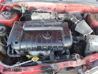 2005 Hyundai Accent GLS with VIN KMHCG35C65U348300, listed as a Copart auction lot 77847614 with 141,102 mi miles and Salvage Title. Bid and sale history available at carsss.com. Image 11.