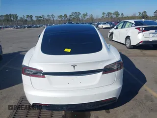 2021 Tesla Model S Long Range with VIN 5YJSA1E56MF453711, listed as a IAAI auction lot 41467603 with 115,634 mi miles and . Bid and sale history available at DreamBid. Image 16.