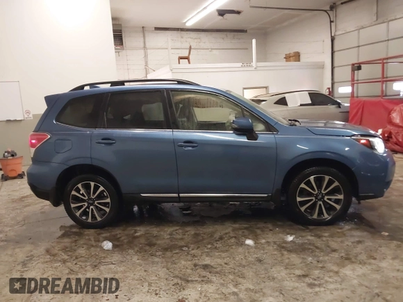 2017 Subaru Forester Touring with VIN JF2SJGTC9HH410251, listed as a IAAI auction lot 41411079 with 131,220 mi miles and . Bid and sale history available at DreamBid. Image 13.
