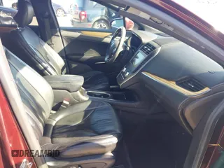 2016 Lincoln MKC Select z VIN 5LMCJ2C96GUJ00891, wystawiony jako IAAI lot #41962387 z przebiegiem 173 999 mil mil oraz . Historia ofert i sprzedaży dostępna na DreamBid. Obrazek 5.