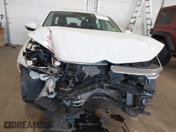 2021 Volkswagen Passat SE with VIN 1VWSA7A30MC014179, listed as a IAAI auction lot 42342358 with 77,535 mi miles and . Bid and sale history available at DreamBid. Image 6.