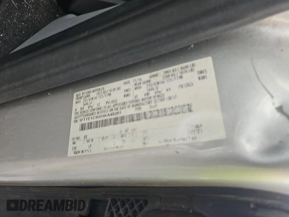 2017 Ford Transit Cargo z VIN 1FTYE1CMXHKA48291, wystawiony jako IAAI lot #42731289 z przebiegiem 142 973 mil mil oraz . Historia ofert i sprzedaży dostępna na DreamBid. Obrazek 10.