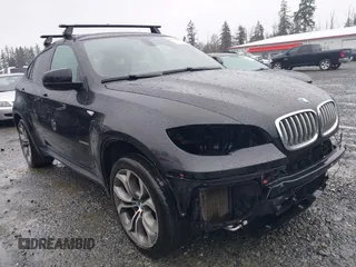 2014 BMW X6 50i z VIN 5UXFG8C57EL593257, wystawiony jako IAAI lot #41655486 z przebiegiem 128 292 mil mil oraz . Historia ofert i sprzedaży dostępna na DreamBid. Obrazek 1.