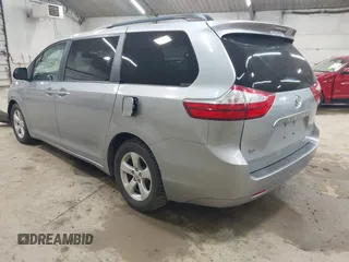 2015 Toyota Sienna LE AAS with VIN 5TDKK3DC9FS622028, listed as a IAAI auction lot 42740303 with 132,529 mi miles and . Bid and sale history available at DreamBid. Image 3.