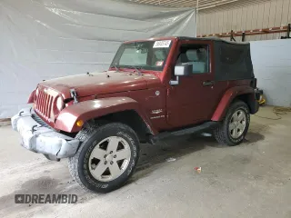 2010 Jeep Wrangler Sahara z VIN 1J4GA5D11AL106768, wystawiony jako Copart lot #56935745 z przebiegiem 143 212 mil mil oraz Szkoda całkowita • Salvage title. Historia ofert i sprzedaży dostępna na DreamBid. Obrazek 1.