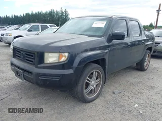 2006 Honda Ridgeline RTL with VIN 2HJYK16526H517466, listed as a IAAI auction lot 42737202 with 184,856 mi miles and . Bid and sale history available at DreamBid. Image 2.