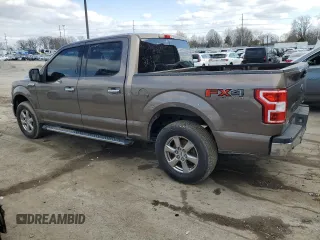 2018 Ford F-150 XL with VIN 1FTEW1EG1JKD01897, listed as a Copart auction lot 52923115 with 219,341 mi miles and Clean Title. Bid and sale history available at carsss.com. Image 2.