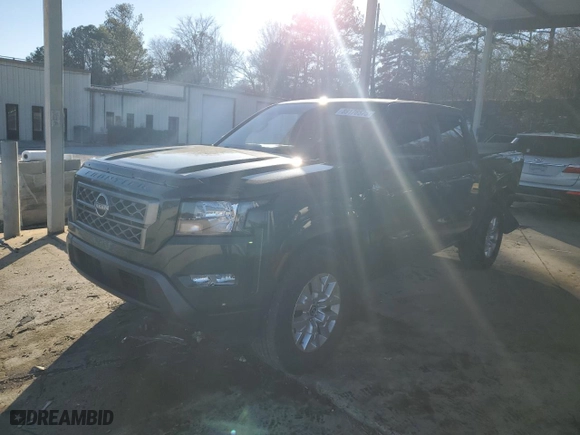 2022 Nissan Frontier PRO-X with VIN 1N6ED1EJ1NN603029, listed as a Copart auction lot 89176575 with 57,371 mi miles and Salvage Title. Bid and sale history available at carsss.com. Image 1.
