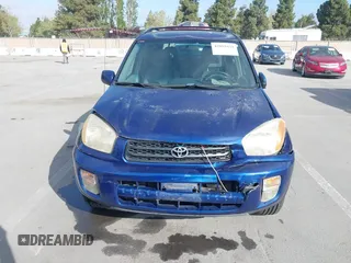 2003 Toyota RAV4 with VIN JTEGH20V630113868, listed as a IAAI auction lot 42091639 with 167,781 mi miles. Bid and sale history available at carsss.com. Image 6.