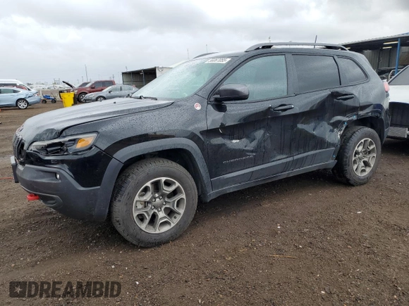 2020 Jeep Cherokee Trailhawk with VIN 1C4PJMBX2LD588381, listed as a Copart auction lot 56067055 with 82,467 mi miles and Salvage title. Bid and sale history available at DreamBid. Image 1.
