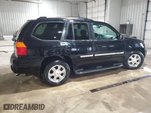 2003 GMC Envoy SLT with VIN 1GKDT13S232251871, listed as a Copart auction lot 45306785 with 174,303 mi miles and Salvage Title. Bid and sale history available at carsss.com. Image 3.