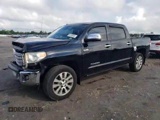 2014 Toyota Tundra Limited with VIN 5TFFY5F1XEX151121, listed as a Copart auction lot 64763845 with 180,717 mi miles and Salvage title. Bid and sale history available at DreamBid. Image 1.