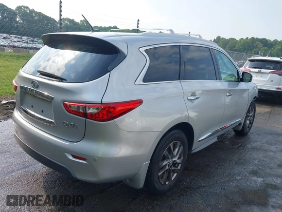 2015 Infiniti QX60 with VIN 5N1AL0MM8FC511242, listed as a IAAI auction lot 42577329 with 144,140 mi miles and . Bid and sale history available at DreamBid. Image 4.