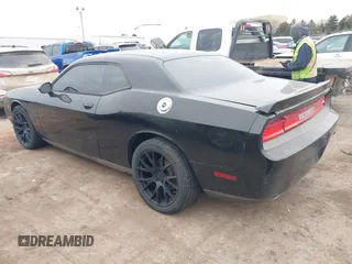 2013 Dodge Challenger SXT z VIN 2C3CDYAGXDH718768, wystawiony jako IAAI lot #41339735 z przebiegiem 187 052 mil mil oraz . Historia ofert i sprzedaży dostępna na DreamBid. Obrazek 15.