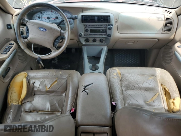 2002 Ford Explorer Sport Trac Value с VIN 1FMZU67E02UC99187, выставлен на аукционе Copart как лот 61557615 с пробегом 202 530 миль миль и Списание • Salvage title. История ставок и продаж доступна на DreamBid. Изображение 8.