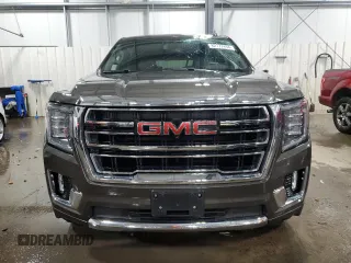 2021 GMC Yukon XL SLT with VIN 1GKS2GKD1MR434218, listed as a Copart auction lot 82777494 with 60,601 mi miles and Salvage Title. Bid and sale history available at carsss.com. Image 5.