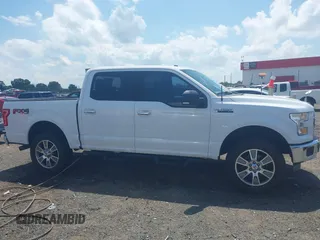 2015 Ford F-150 XLT with VIN 1FTEW1EFXFKD32631, listed as a IAAI auction lot 42454554 with 162,104 mi miles and . Bid and sale history available at DreamBid. Image 13.