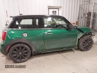 2020 MINI Hardtop Cooper S z VIN WMWXR5C01L2L36999, wystawiony jako IAAI lot #41404558 z przebiegiem 24 930 mil mil oraz . Historia ofert i sprzedaży dostępna na DreamBid. Obrazek 14.