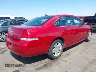 2014 Chevrolet Impala LT with VIN 2G1WB5E38E1132304, listed as a IAAI auction lot 42072869 with 128,579 mi miles and . Bid and sale history available at DreamBid. Image 4.