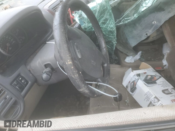 2003 Kia Sedona LX with VIN KNDUP131836430383, listed as a Copart auction lot 79829254 with 198,896 mi miles and Salvage Title. Bid and sale history available at carsss.com. Image 7.