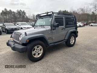 2013 Jeep Wrangler Sport with VIN 1C4AJWAG7DL605881, listed as a IAAI auction lot 41980930 with 214,662 mi miles and . Bid and sale history available at carsss.com. Image 2.