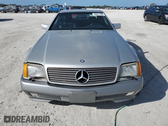 1991 MERCEDES-BENZ SL-CLASS SL with VIN WDBFA61E1MF022918, listed as a Copart auction lot 85011784 with 262,144 mi miles and Salvage Title. Bid and sale history available at DreamBid. Image 5.