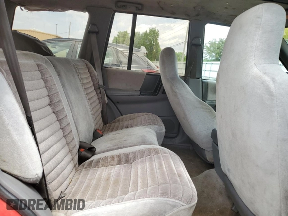 1994 Jeep Grand Cherokee Laredo с VIN 1J4GZ58S7RC311048, выставлен на аукционе Copart как лот 56759635 с пробегом 242 460 миль миль и Списание • Salvage title. История ставок и продаж доступна на DreamBid. Изображение 11.