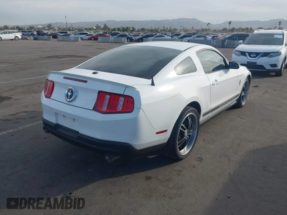 2012 Ford Mustang V6 Premium with VIN 1ZVBP8AM5C5214524, listed as a IAAI auction lot 41205445 with 146,218 mi miles. Bid and sale history available at carsss.com. Image 4.