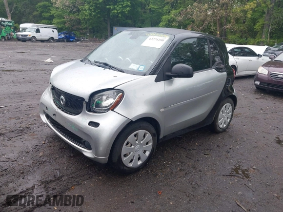 2016 Smart fortwo Passion z VIN WMEFJ5DA3GK055906, wystawiony jako IAAI lot #42274280 z przebiegiem 29 070 mil mil oraz . Historia ofert i sprzedaży dostępna na DreamBid. Obrazek 2.