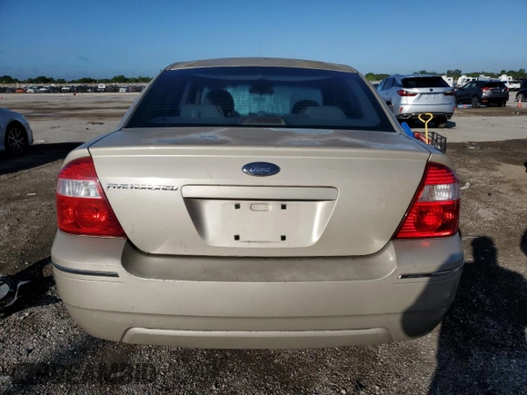 2006 Ford Five Hundred SE with VIN 1FAFP23146G150866, listed as a Copart auction lot 77141084 with 233,540 mi miles and Salvage Title. Bid and sale history available at carsss.com. Image 6.