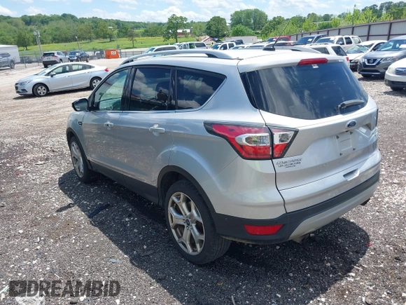 2017 Ford Escape Titanium with VIN 1FMCU0J99HUB23567, listed as a IAAI auction lot 42127795 with 93,056 mi miles. Bid and sale history available at carsss.com. Image 3.