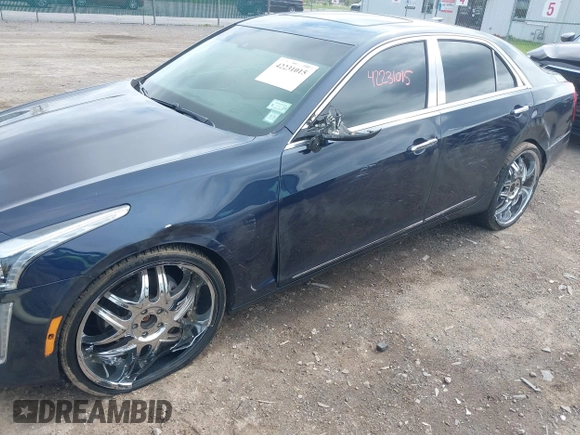 2015 Cadillac CTS Luxury AWD with VIN 1G6AX5SX5F0119102, listed as a IAAI auction lot 42231015 with 106,643 mi miles and . Bid and sale history available at DreamBid. Image 6.