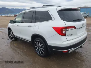 2021 Honda Pilot Elite with VIN 5FNYF6H03MB044154, listed as a IAAI auction lot 41050202 with 60,331 mi miles and . Bid and sale history available at DreamBid. Image 3.