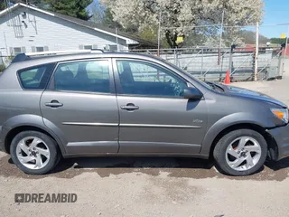 2005 Pontiac Vibe with VIN 5Y2SL63865Z427576, listed as a IAAI auction lot 42051342 with 159,708 mi miles. Bid and sale history available at carsss.com. Image 13.