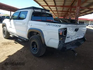 2016 Toyota Tacoma SR with VIN 5TFCZ5ANXGX028464, listed as a IAAI auction lot 41834385 with 124,407 mi miles and . Bid and sale history available at DreamBid. Image 3.