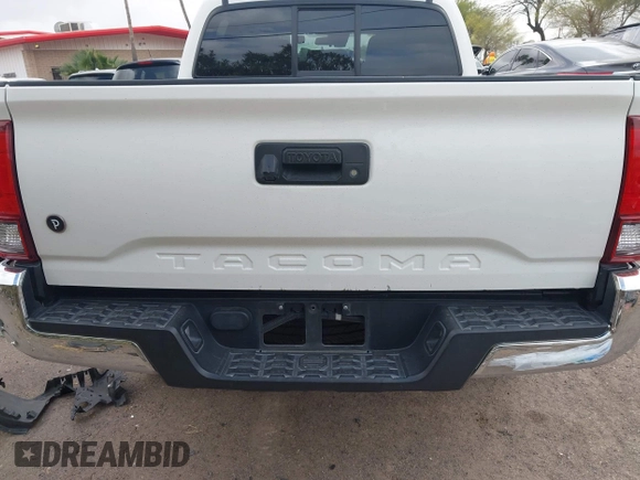 2021 Toyota Tacoma SR with VIN 3TYAX5GN6MT018475, listed as a IAAI auction lot 41966835 with 42,780 mi miles and . Bid and sale history available at DreamBid. Image 16.