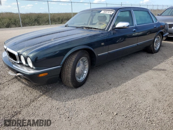 1999 Jaguar XJ with VIN SAJKX6047XC861227, listed as a Copart auction lot 75007414 with Not provided miles and Salvage title. Bid and sale history available at DreamBid. Image 1.