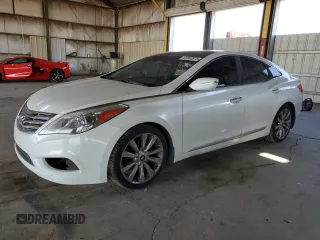 2013 Hyundai Azera z VIN KMHFH4JG4DA284542, wystawiony jako Copart lot #62860875 z przebiegiem 252 592 mil mil oraz Czysty tytuł • Clean title. Historia ofert i sprzedaży dostępna na DreamBid. Obrazek 1.