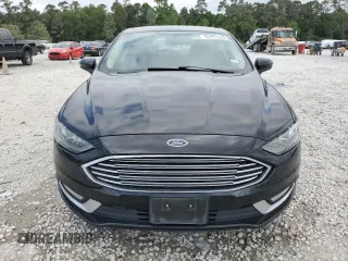 2017 Ford Fusion SE z VIN 3FA6P0H75HR228505, wystawiony jako Copart lot #53251205 z przebiegiem 144 898 mil mil oraz Czysty tytuł • Clean title. Historia ofert i sprzedaży dostępna na DreamBid. Obrazek 5.