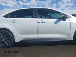 2023 Toyota Corolla SE with VIN 5YFS4MCE7PP157097, listed as a IAAI auction lot 41846383 with 23,487 mi miles and . Bid and sale history available at DreamBid. Image 13.