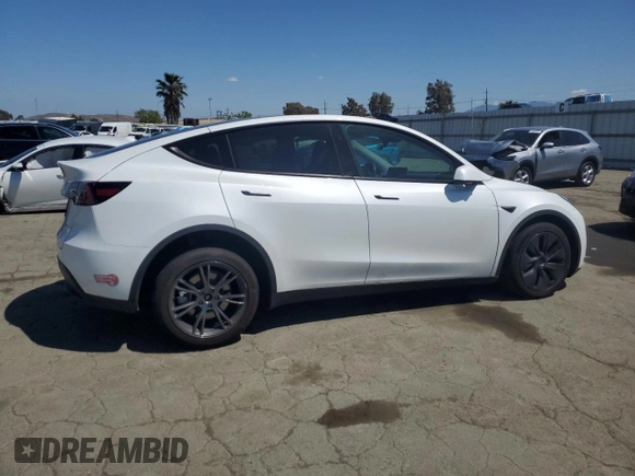 2024 Tesla Model Y Long Range с VIN 7SAYGDEE6RF157415, выставлен на аукционе Copart как лот 54950915 с пробегом 20 567 миль миль и Списание • Salvage title. История ставок и продаж доступна на DreamBid. Изображение 3.