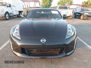 2015 Nissan 370Z Sport z VIN JN1AZ4EH5FM442339, wystawiony jako IAAI lot #42304030 z przebiegiem 73 272 mil mil oraz . Historia ofert i sprzedaży dostępna na DreamBid. Obrazek 12.